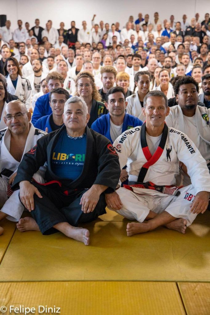 Ricardo Liborio receives his coral belt in jiu-jitsu